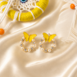 Pearl Kissed yellow Butterfly Hoops - Image 2