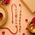Ruby Pearl Royale Rakhi & Lumba Set
